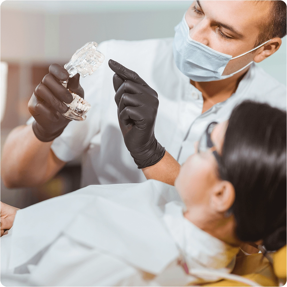 Patient showing example of denture