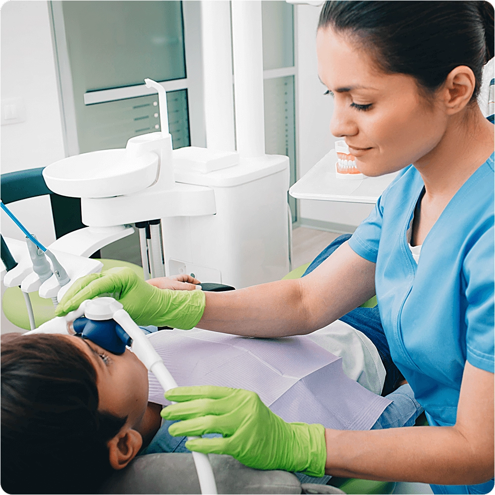 Dentist applying sedation 