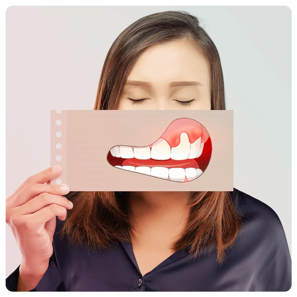 Person with paper with illustration of gum disease