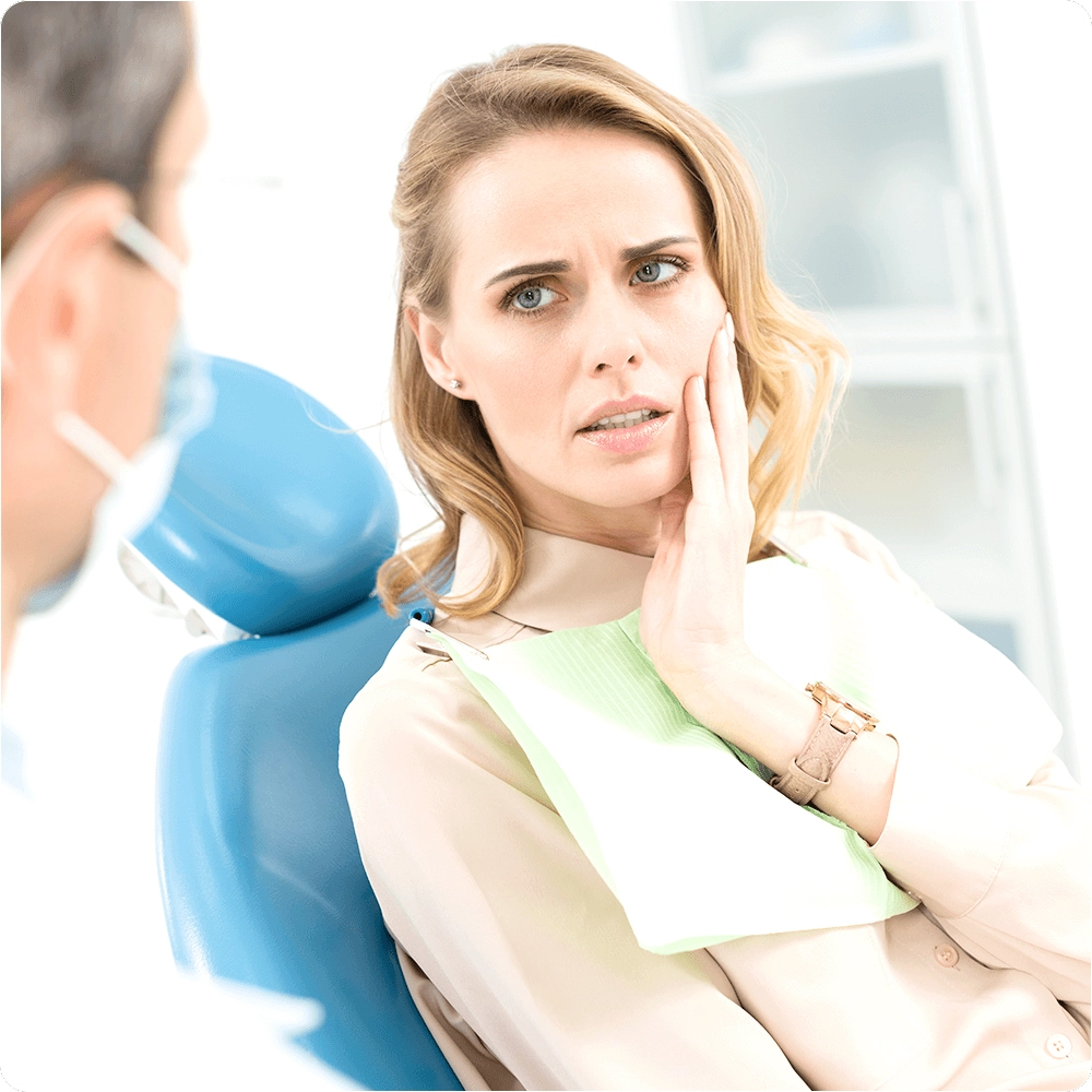 Patient with pain at the dentist