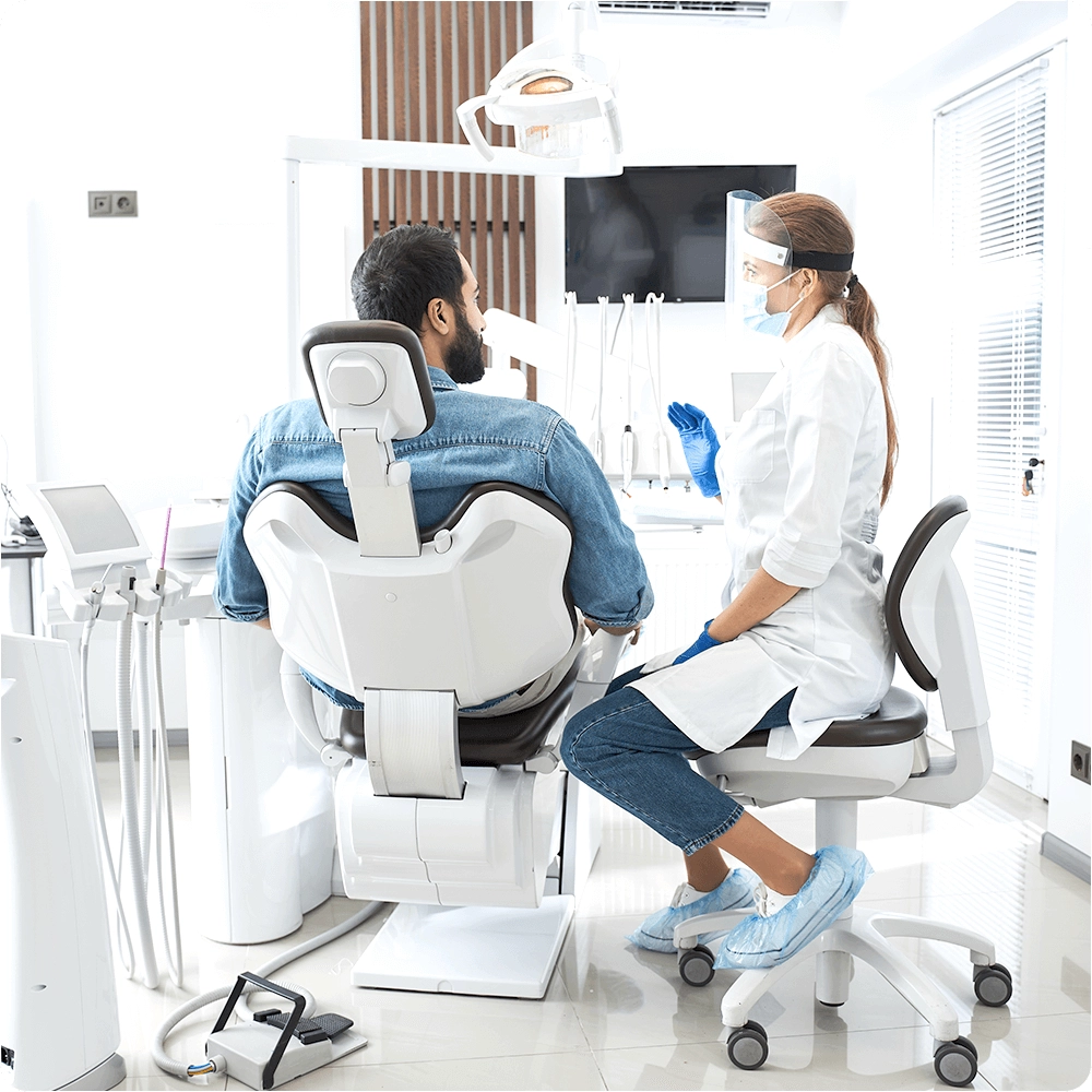 Patient and dentist talking