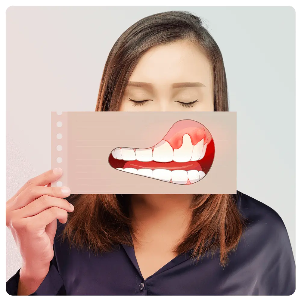 Person with paper with illustration of gum disease