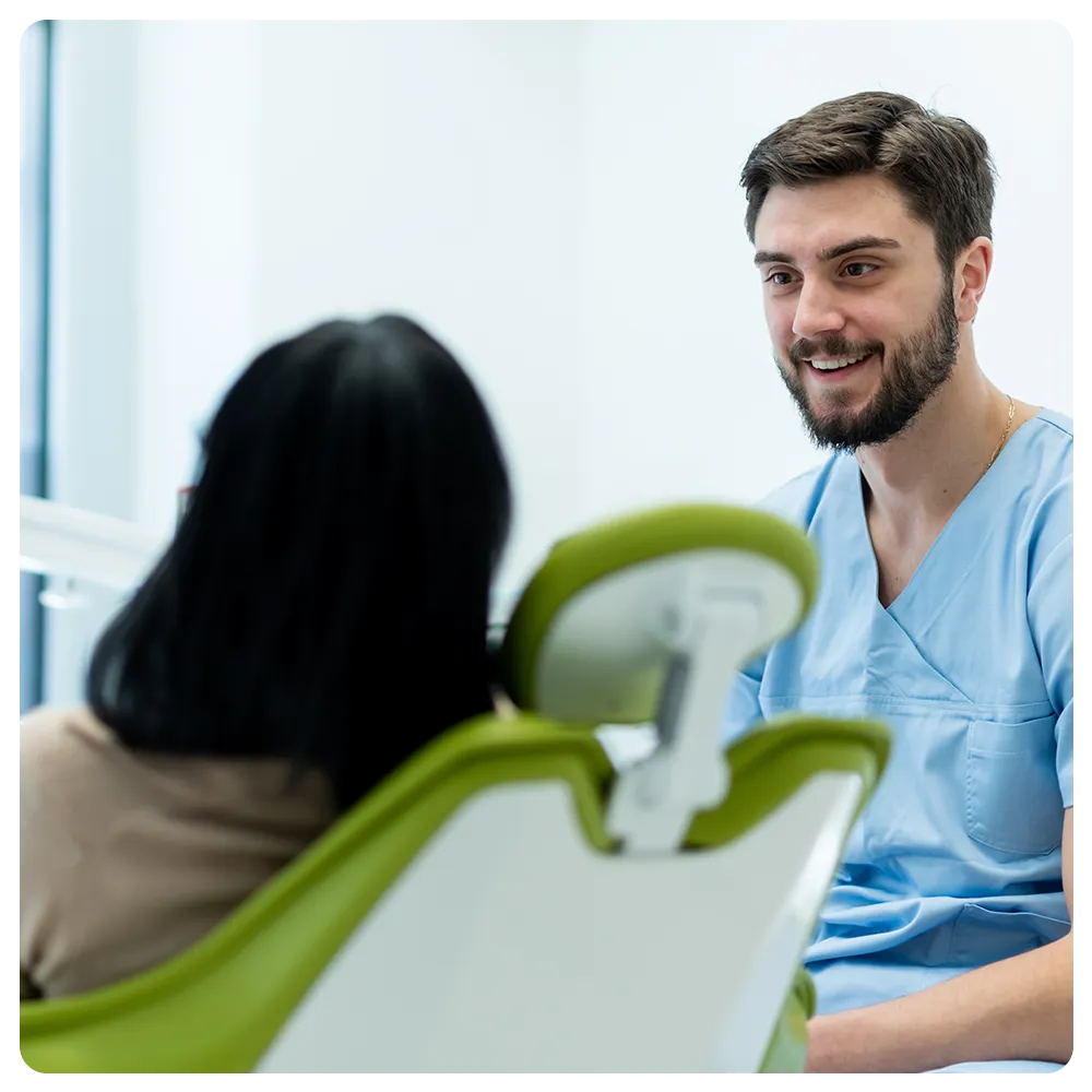 dentist checking female patient