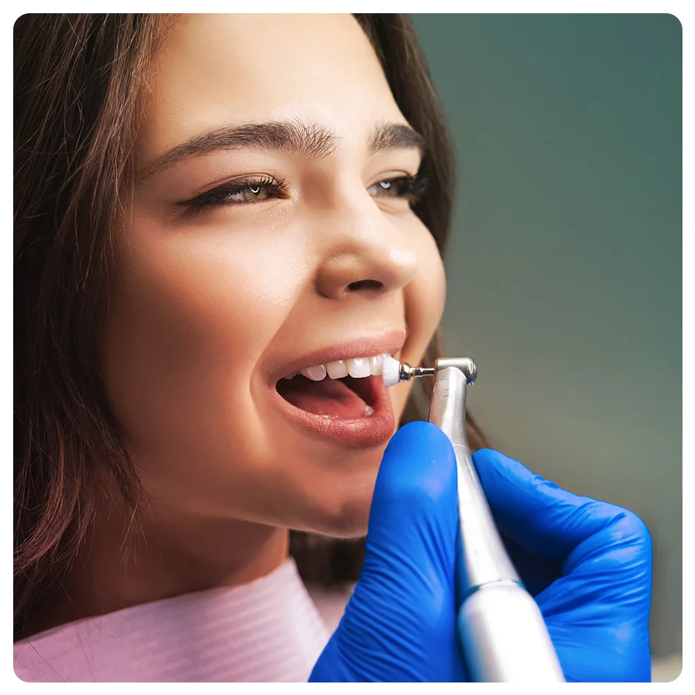 Dentist and patient looking at dental plaque