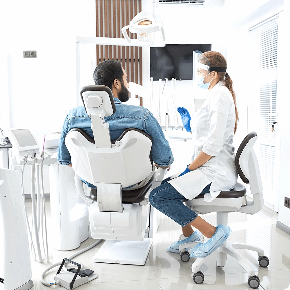Patient and dentist talking